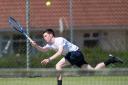 Ronan McKeever stretching for a shot during a rally in his Men's Singles final.*.
