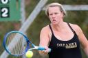 Louise McGann plays a forehand at the Fermanagh Veterans Championships.*