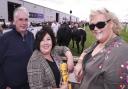 Trevor and Claire Armstrong with Alana Abraham, enjoying the cattle at Balmoral Show 2024.
