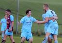 Cathal Beacom is congratulated after equalising for Town against Tummery.