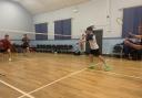 Action from the final of the Aughadrumsee Badminton Club tournament.