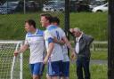 The Magheraveely players celebrate as they win over Omagh Hospitals saw them survive the drop from Division One.