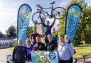Frankie Reihill holds aloft the bicycle as he is flanked by Mark McCreesh (Cassidy and McCreesh Orthodontic Practice), Damien Teague (Clones Cycliing Club),
Brian McCabe (Lisnaskea Emmetts), Caroline Ferguson (Action Mental Health), Colin Maguire