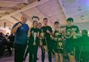 Erne Boxing Club boxers are all smiles as they are pictured with their trophies