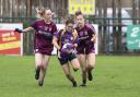 Ciara Leonard tries to outpace Aoife Mallon and Maebh Kelly.