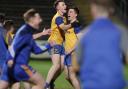 Ciaran Smith in congratulated by Conor Love after his penalty sent Enniskillen through against Gowna at Brewster Park tonight.