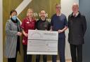 At the presentation of a cheque for £3,066.42 to a specialist cancer unit at Altnagelvin Hospital, with the funds raised by the Fr. John Kearns Memorial Run in late 2022.
