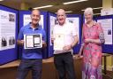 Brian and Tony Keenan, sons of the late Ted Keenan, launching the Ted Keenan Exhibition at Enniskillen Library. Also included is Margaret Elliott, Branch Manager, Enniskillen Library.