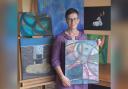 Artist Morag Donald pictured with a number of her pieces.