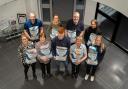 Encirc employees with foodbank donations as part of The Impartial Reporter's foodbank appeal.