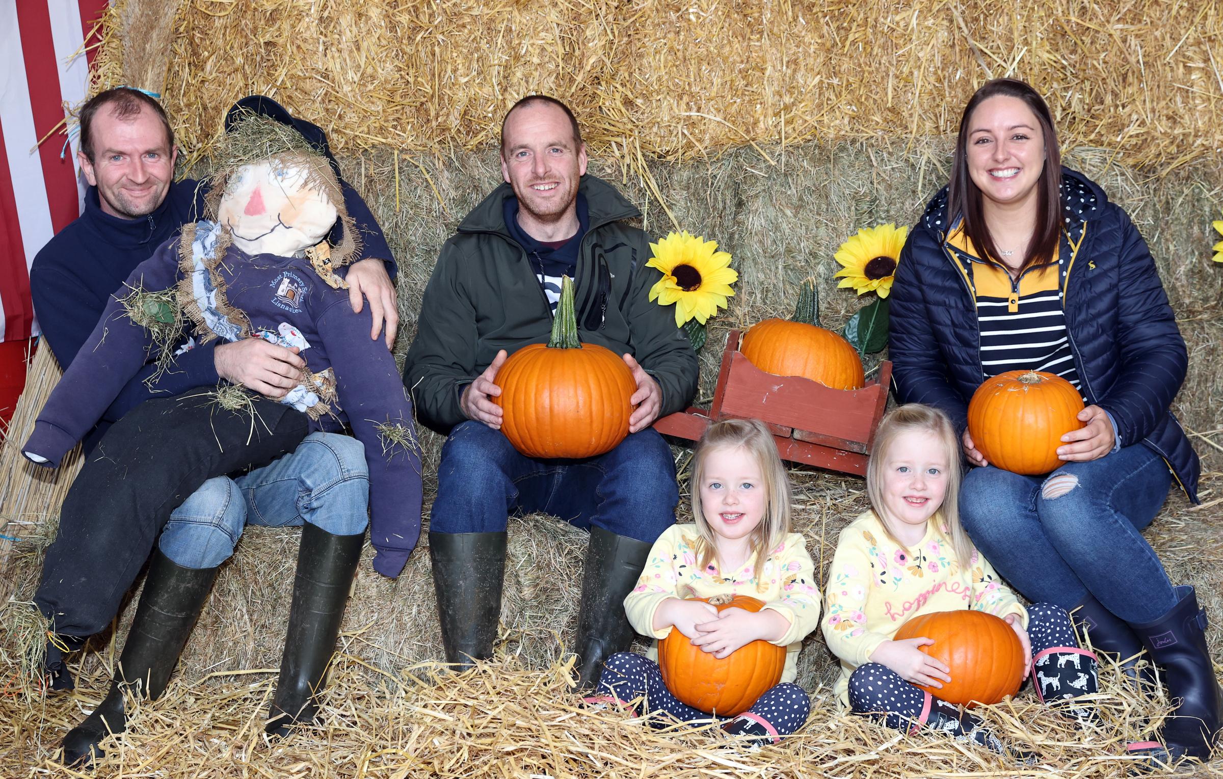 Enjoying the Pumpkin Day at Lappins Vegetable Farm are from left, Kyle Livingstone, Alan Burleigh and Melissa Bereseford. Seated are Ellie and Evie Burleigh.