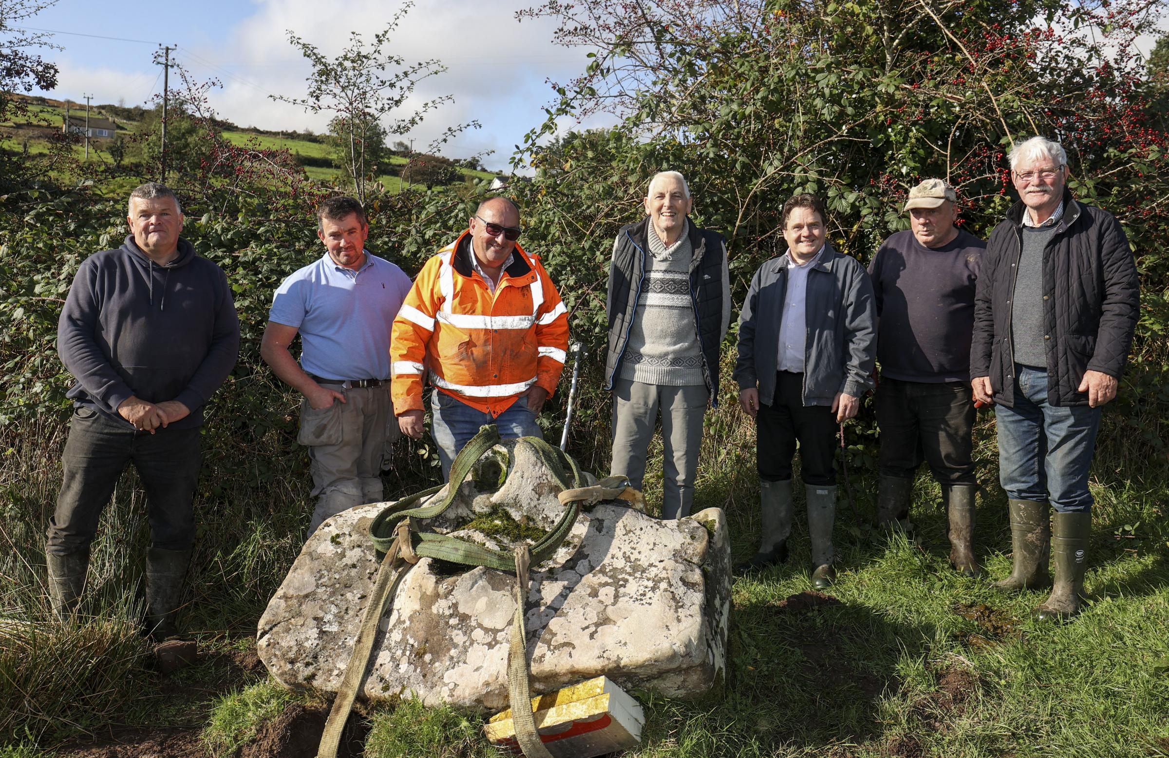 Local volunteers helping to to move The Mass rock near Tempo, Co.Fermanagh are from left, Gerry Harte, Ruari McKeagney, (junior), Phil McGrenaghan, PJ Murphy, Ruari McKeagney, Tony McCaffrey and Tony Murphy.