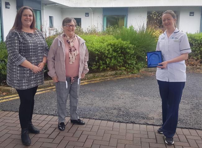 Kathleen O’Brien (patient) with her daughter Grainne pictured with Carmel Greene, Occupational Therapist who has received The Brain Charity Outstanding Healthcare Professional Award for 2021.