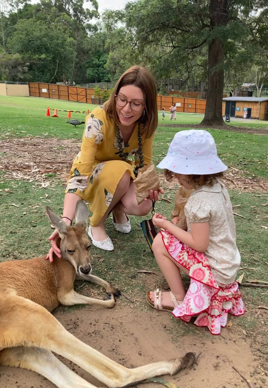 Leesa McCormick and her daughter meet a relaxed kangaroo.