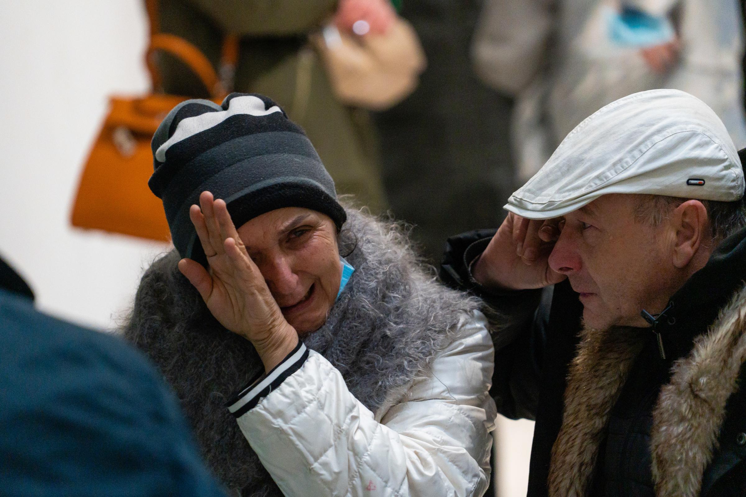 At the refugee reception centre in Przemysl an elderly Ukrainian woman is overcome with emotion and anger as she shouts Putin! Putin! Putin! through her tears. Picture: Ronan McGrade