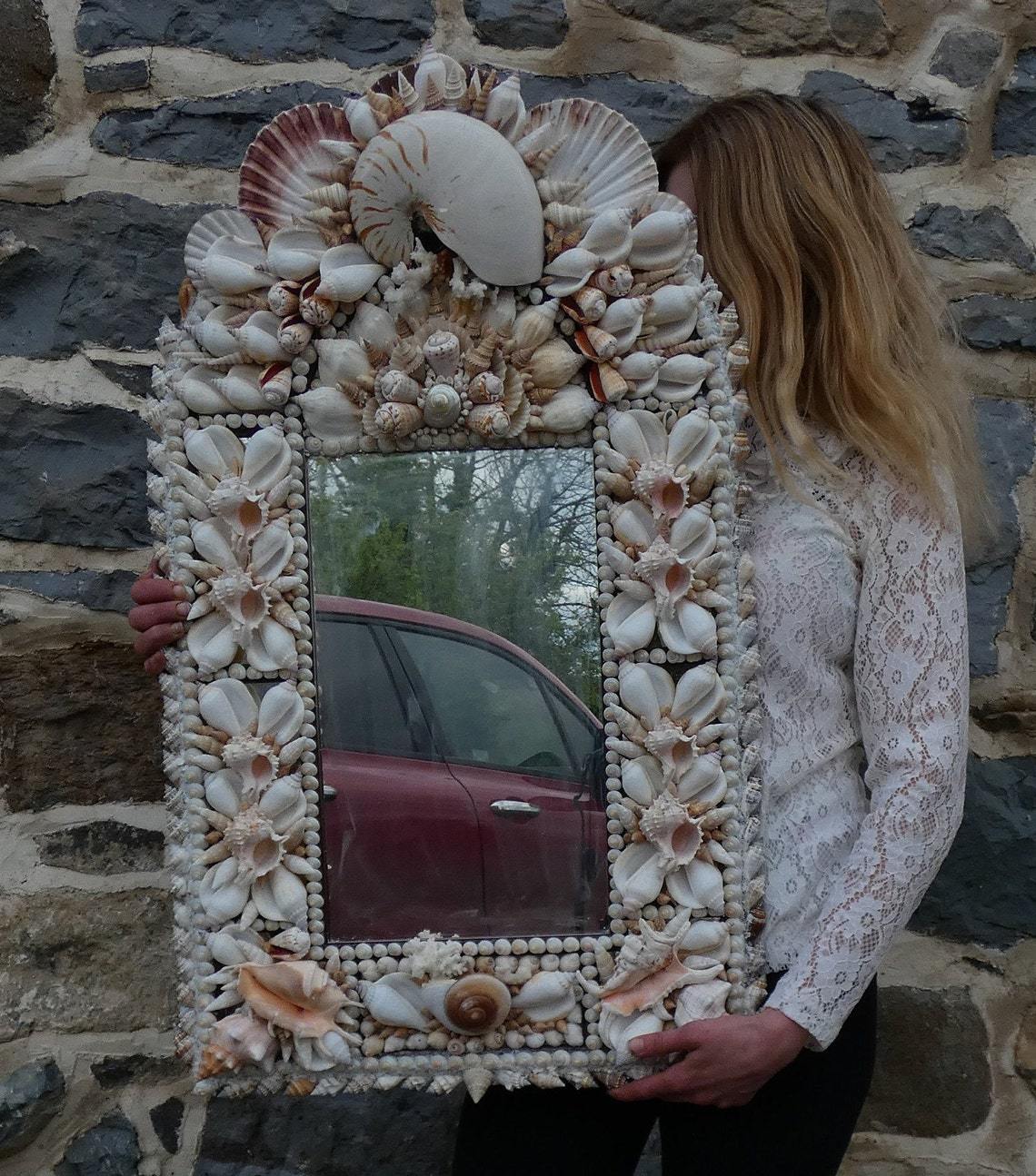  Arch top Mirror featuring a giant nautilus shell and irish scallops.