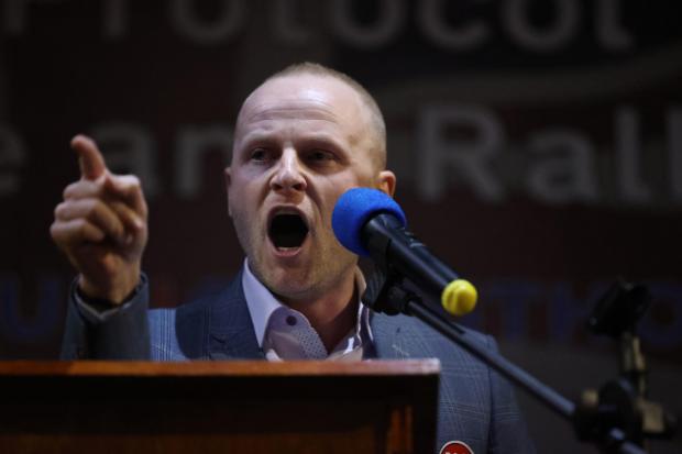 Loyalist blogger Jamie Bryson speaks during a anti Northern Ireland Protocol rally and parade, organised by North Antrim Amalgamated Orange Committee, in Ballymoney, Co Antrim. 
Photo: Liam McBurney/PA Wire.