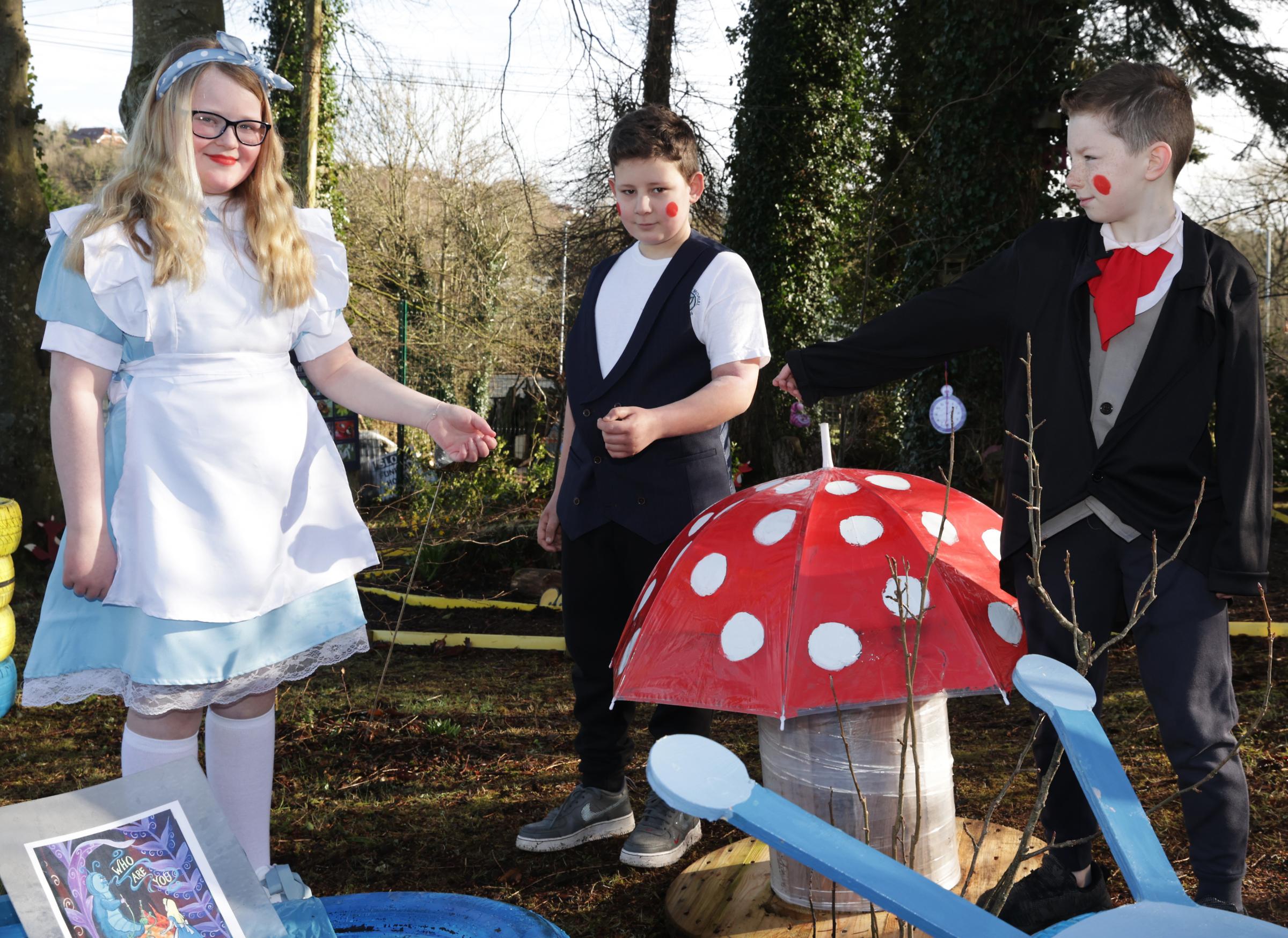 Robyn Bailie, Brooklyn Wills and Cody Kavanagh, who are taking part in The Alice In Wonderland event at the school.