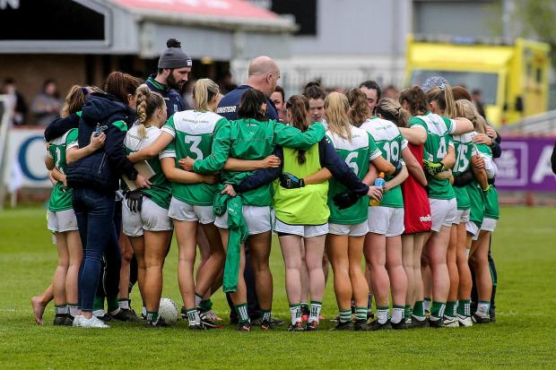 Fermanagh players huddle following their semi final win over Derry.