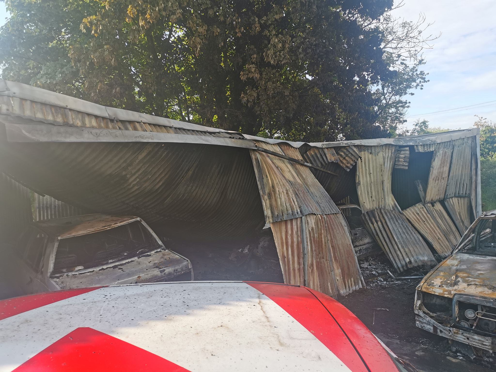 A number of vintage cars were destroyed in a shed fire in the Trillick area.