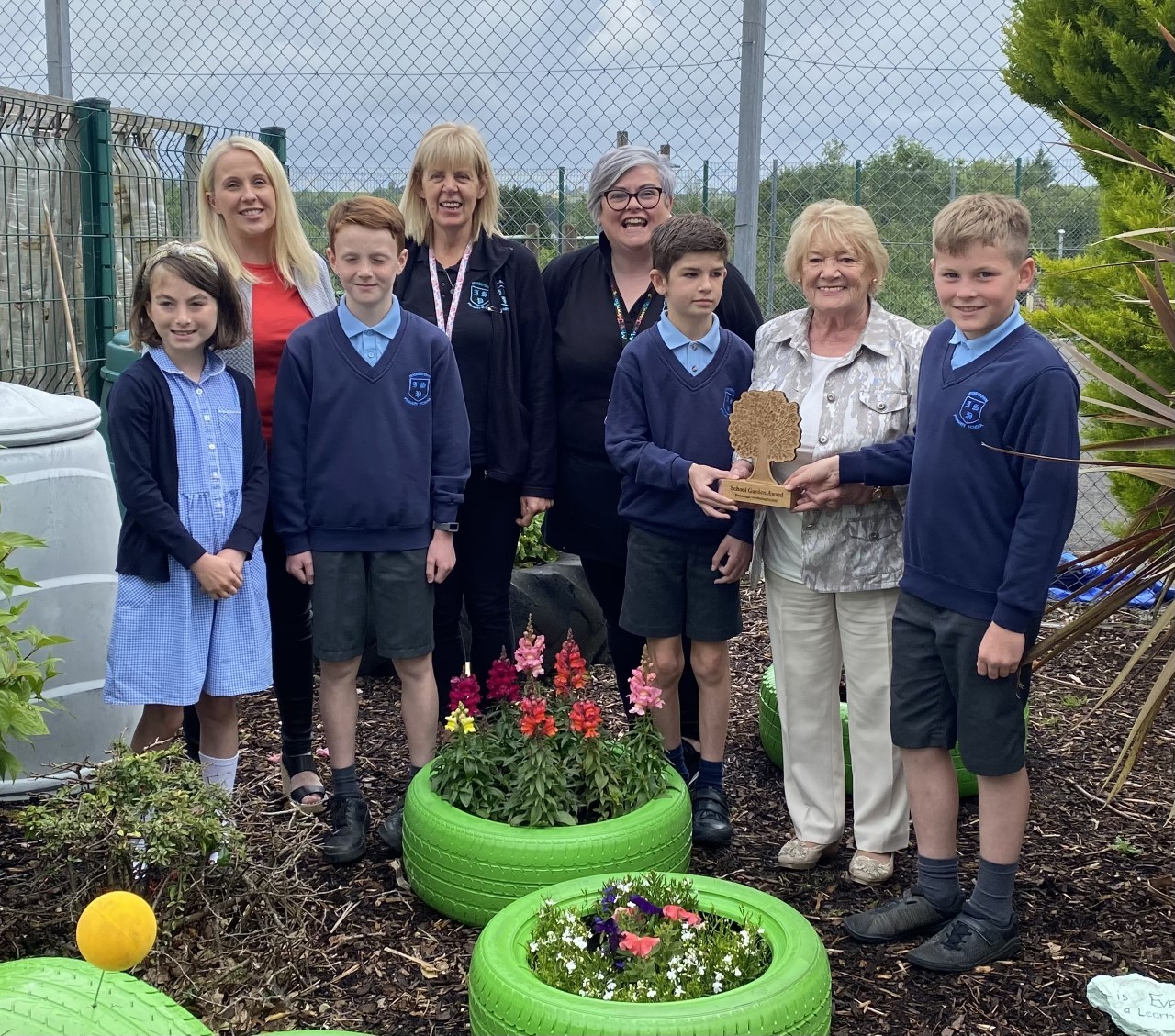 Irvinestown Primary School p6 Eco team receive Garden of the Year Award from Fermanagh Gardening Society President Mrs Evelyn Cruwys. Pictured left to right: Isobel Guida, Mrs Edel Bradshaw (teacher)Bailey Cobaine, Mrs Mary Griffin, Mrs Ethel Johnston,