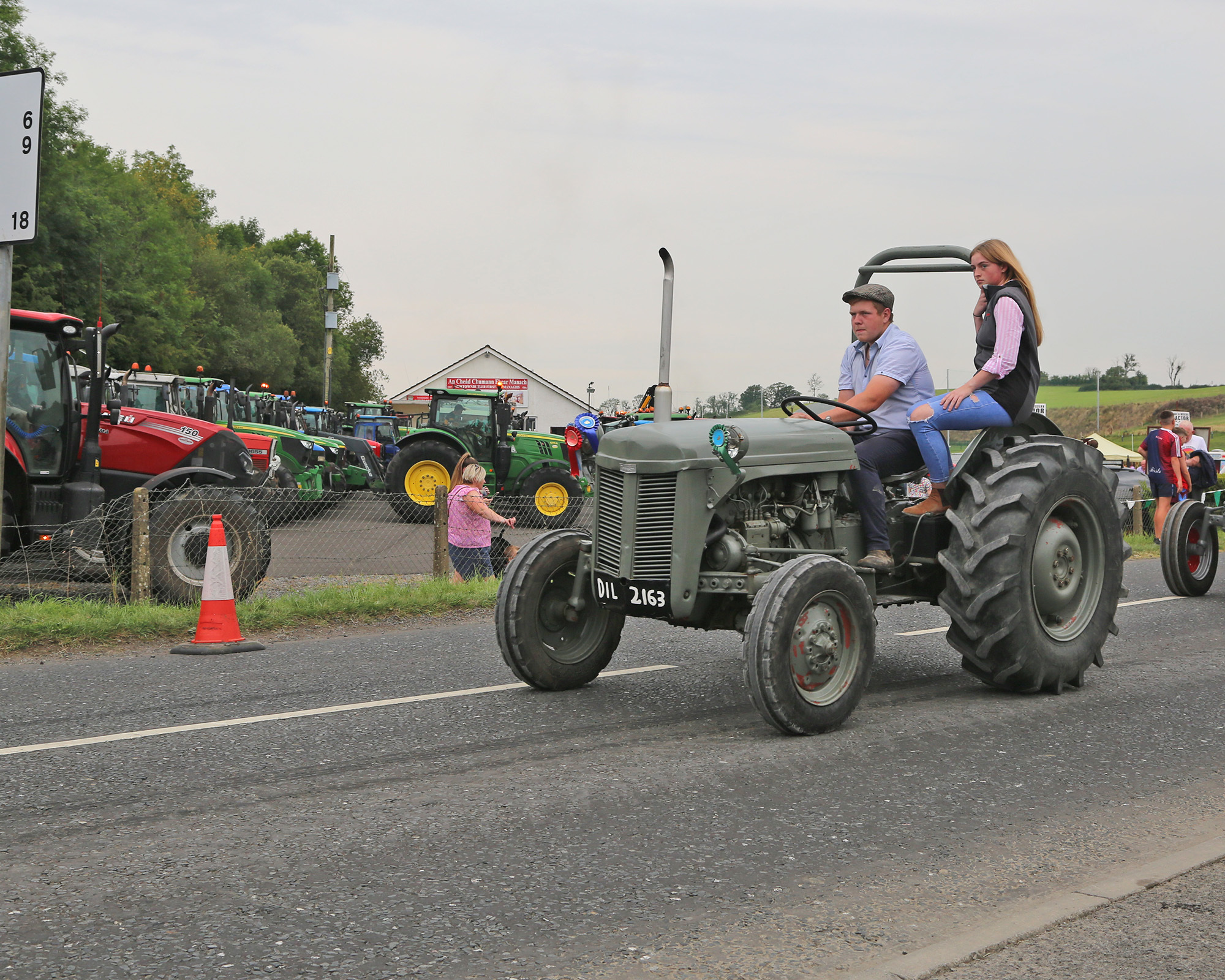 Gerald Clifford with his sister Rachel on the tractor run.