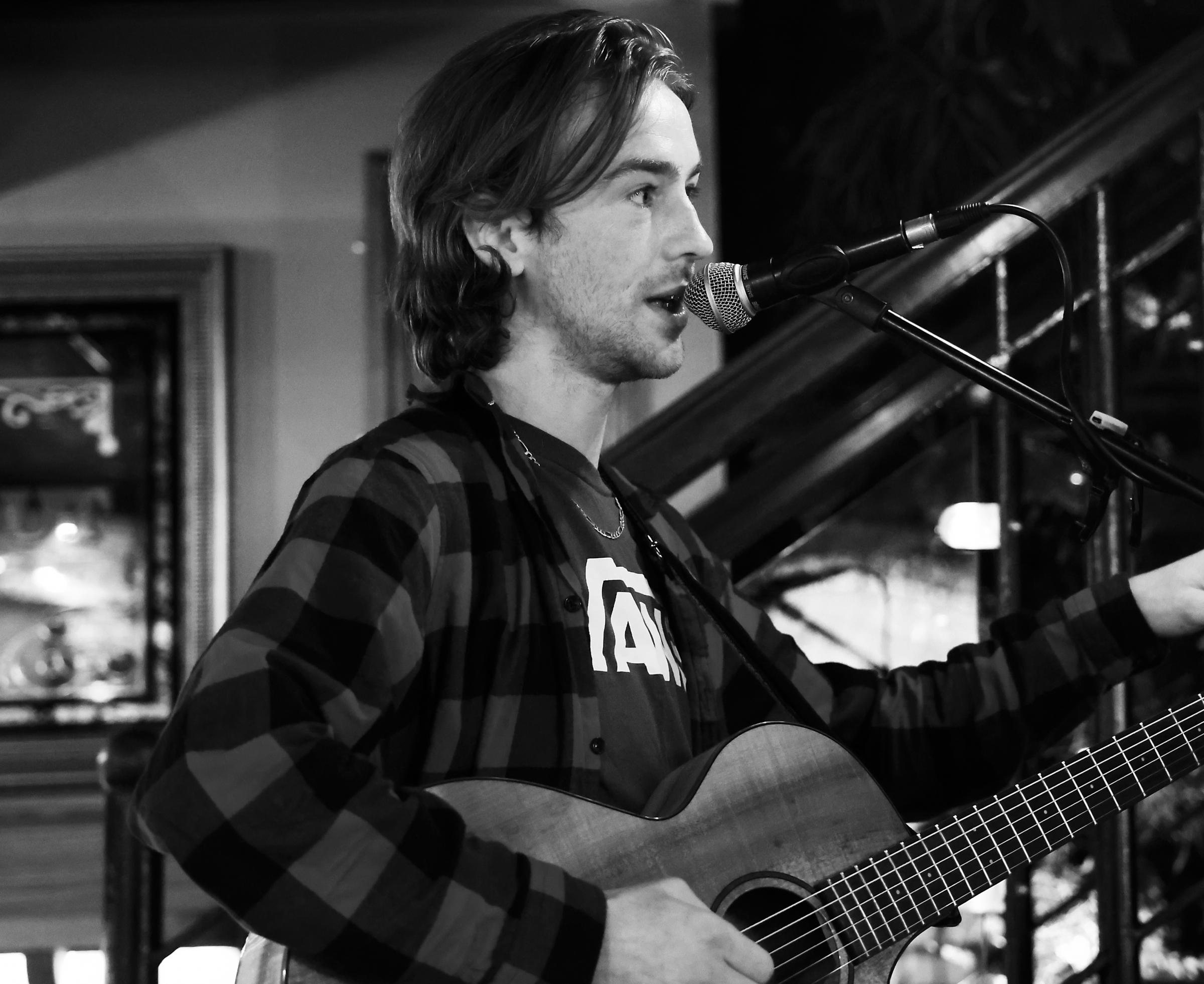 Conor Phillips, host of the Live Lounge Open Mic night in Magees Spirit Store.
