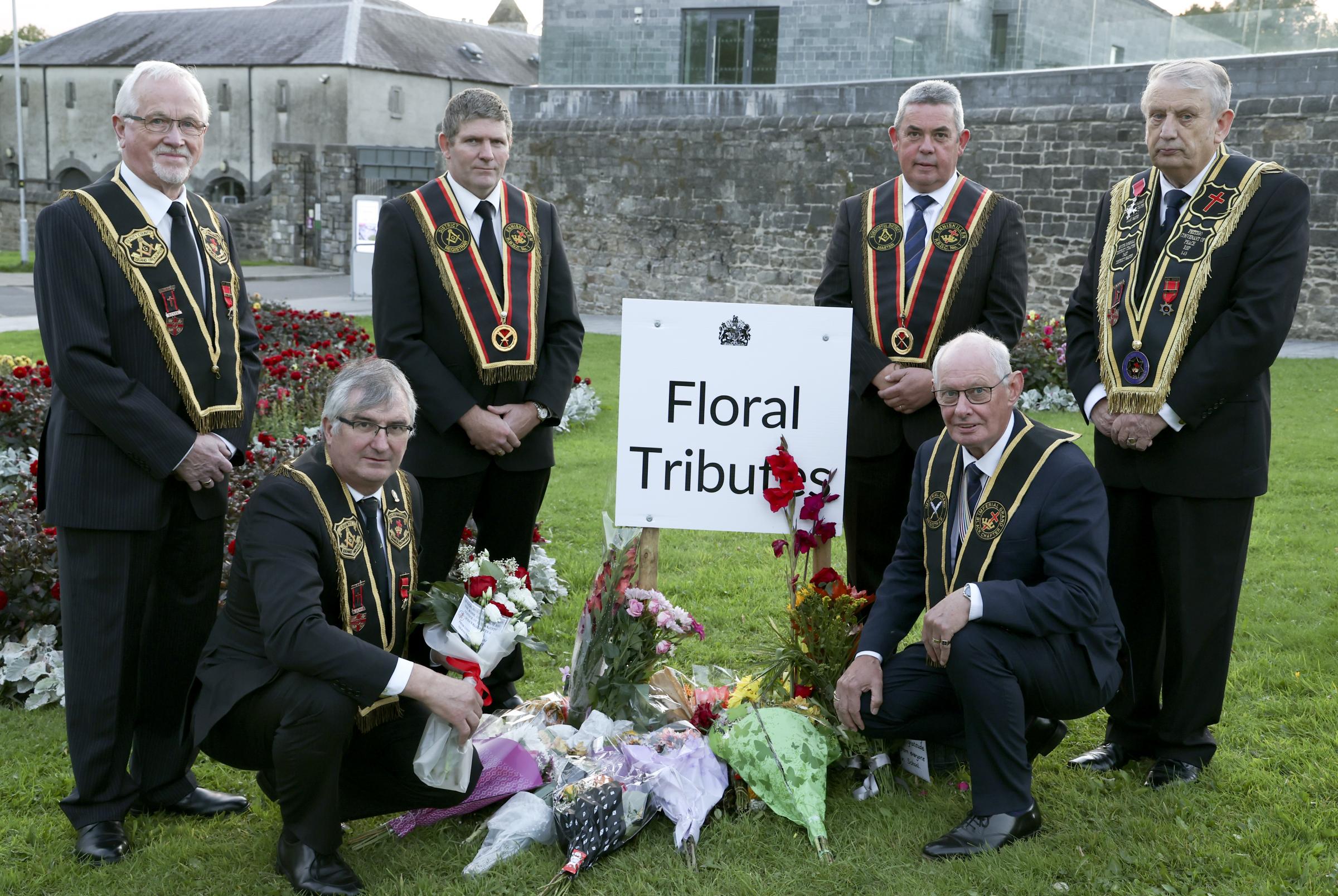 Officers of Co.Fermanagh Royal Black Institution, who layed flowers in memory of Her Majesty Queen Elizabeth II at Enniskillen Castle are, front kneeling from left, Sir Knight, Tom Elliott, County Grand Master and Robert Dane. Back from left are Sir