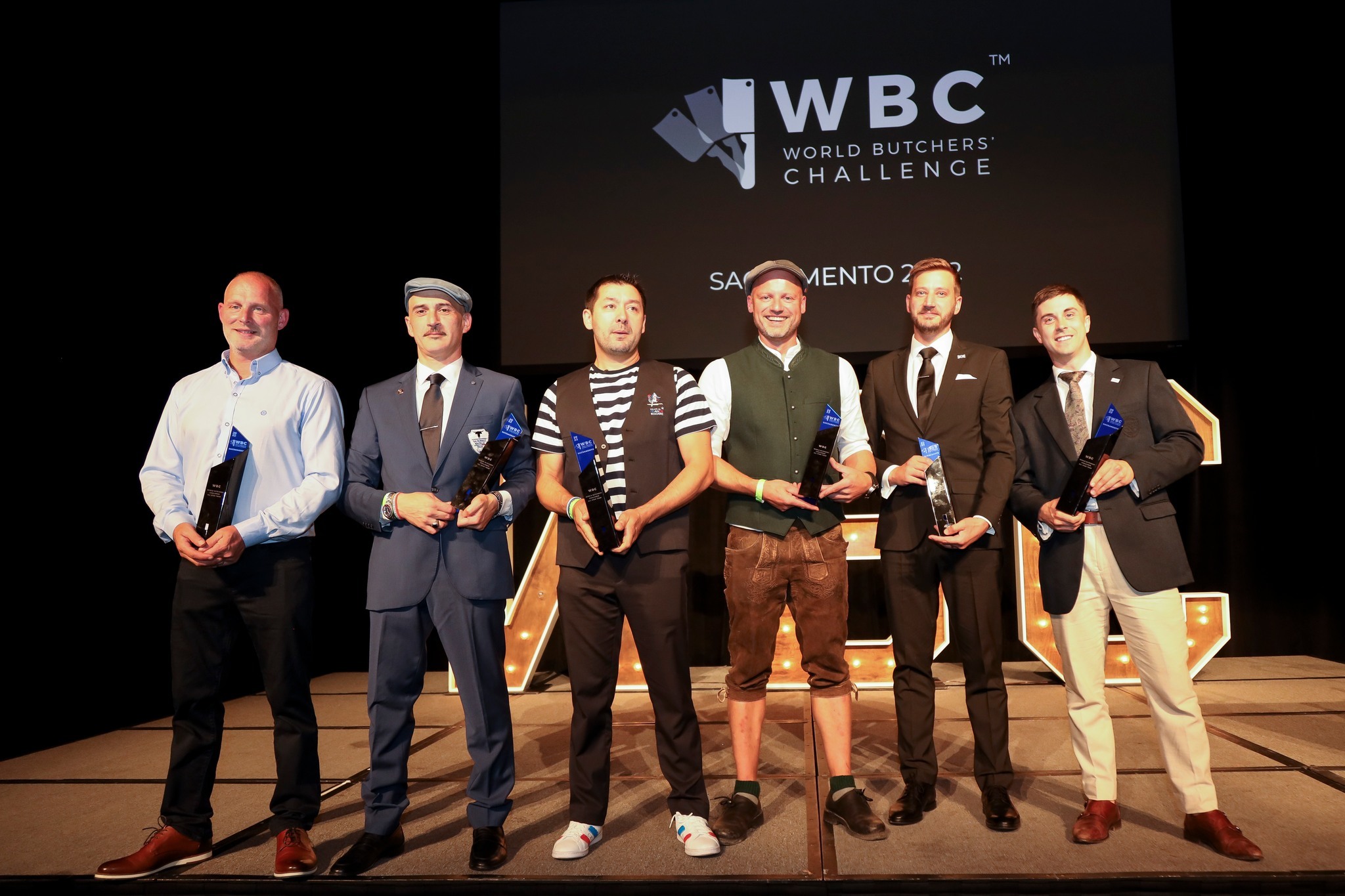 Pictured from left to right the World Butchers’ Challenge 2022 All Stars are Paul Hamilton (Ireland), Gianni Giardina (Italy), Christophe Ip Yan Fat (France), Michel Moser (Germany), Simon Taylor (GB) and Tom Bouchier (Australia). Photo: World