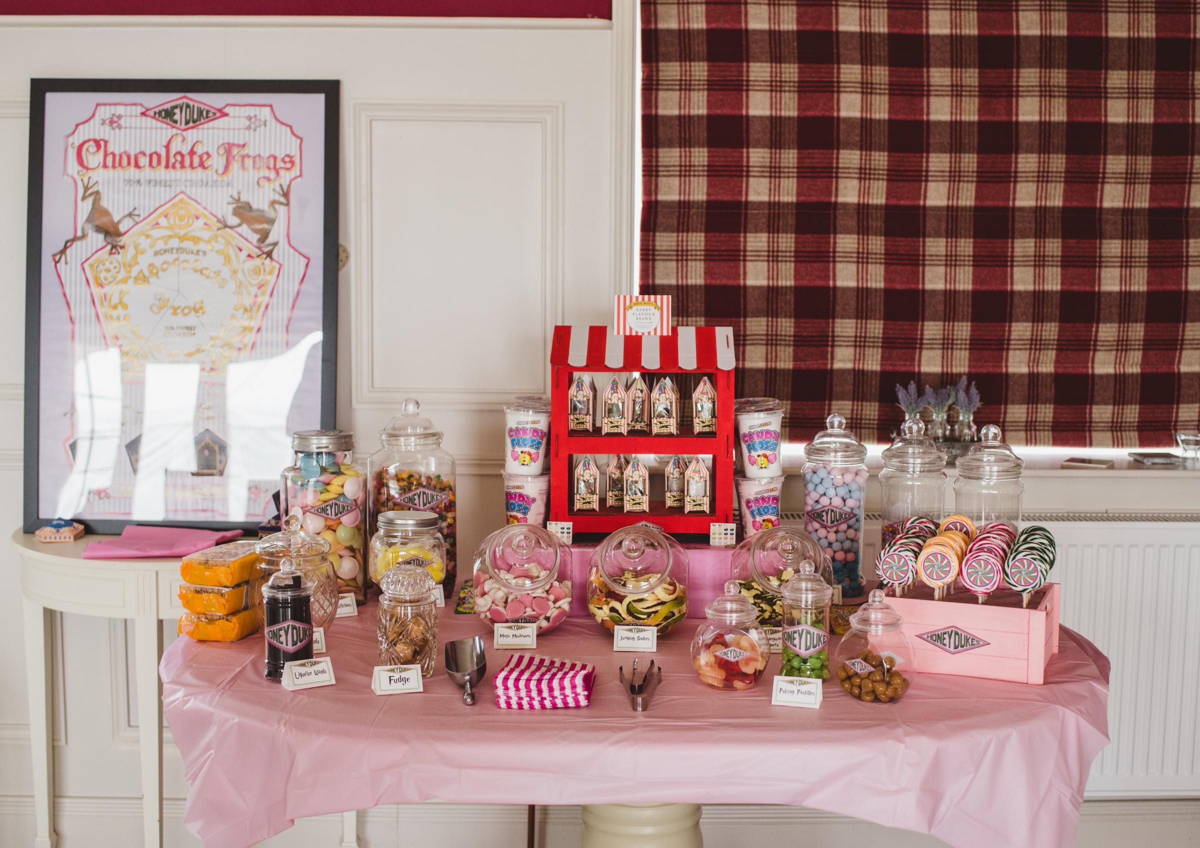 Lesa and Daniel had a sweet table for their guests inspired by Honeydukes sweet shop in Harry Potter. Photo: Erica Irvine.