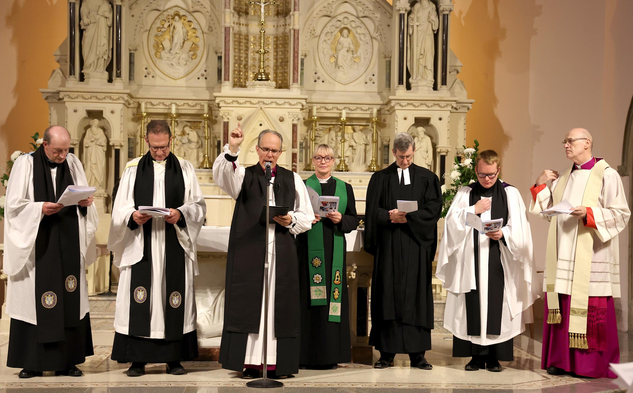 The Bishop of Clogher, the Right Rev. Dr. Ian Ellis (third left), performing the final blessing during the Service of Reflection and Thanksgiving for Her Majesty Queen Elizabeth II, in St. Michaels Church Enniskillen. Also included are Rev. Canon Noel