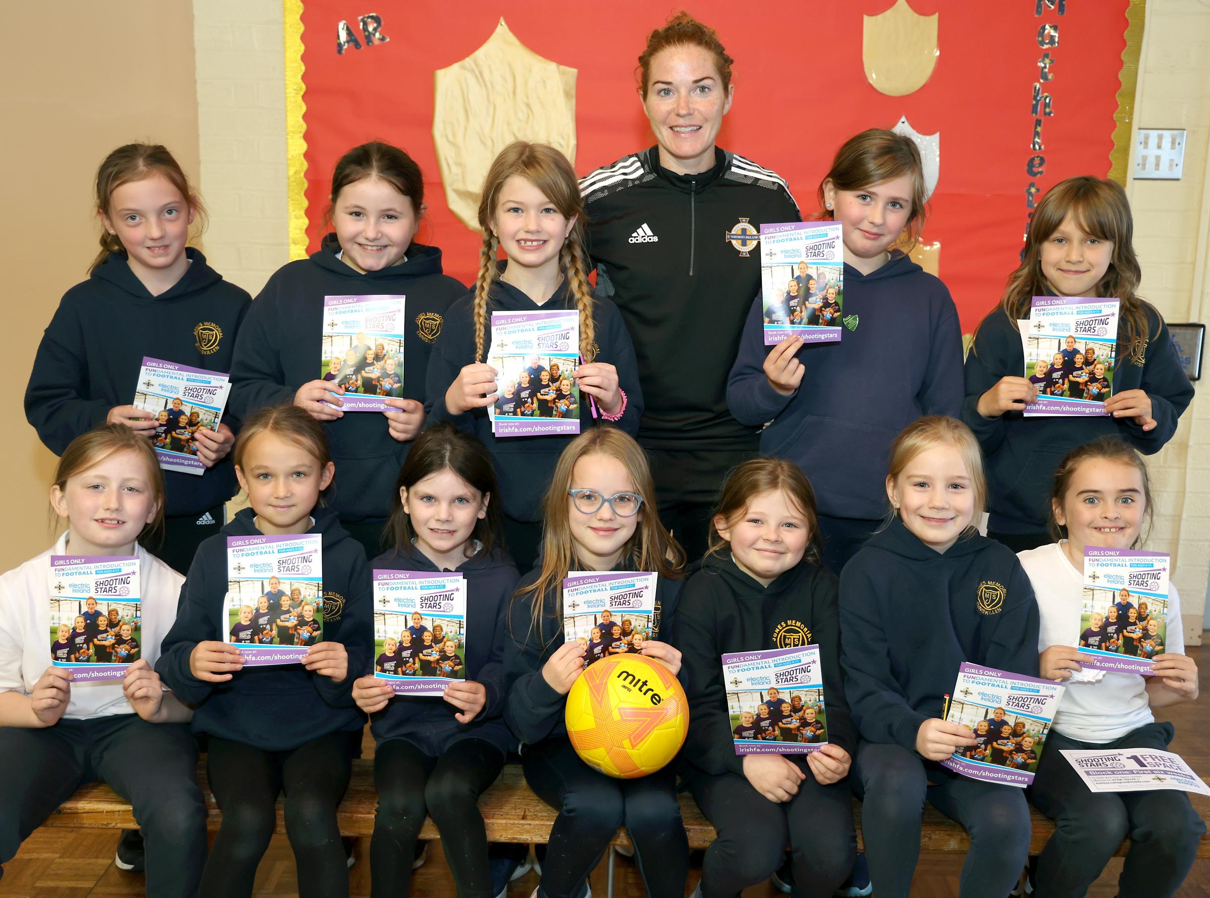 Marissa Callaghan, Northern Ireland Captain and IFA Diversification Officer, with P5 pupils at Jones Memorial Primary School.