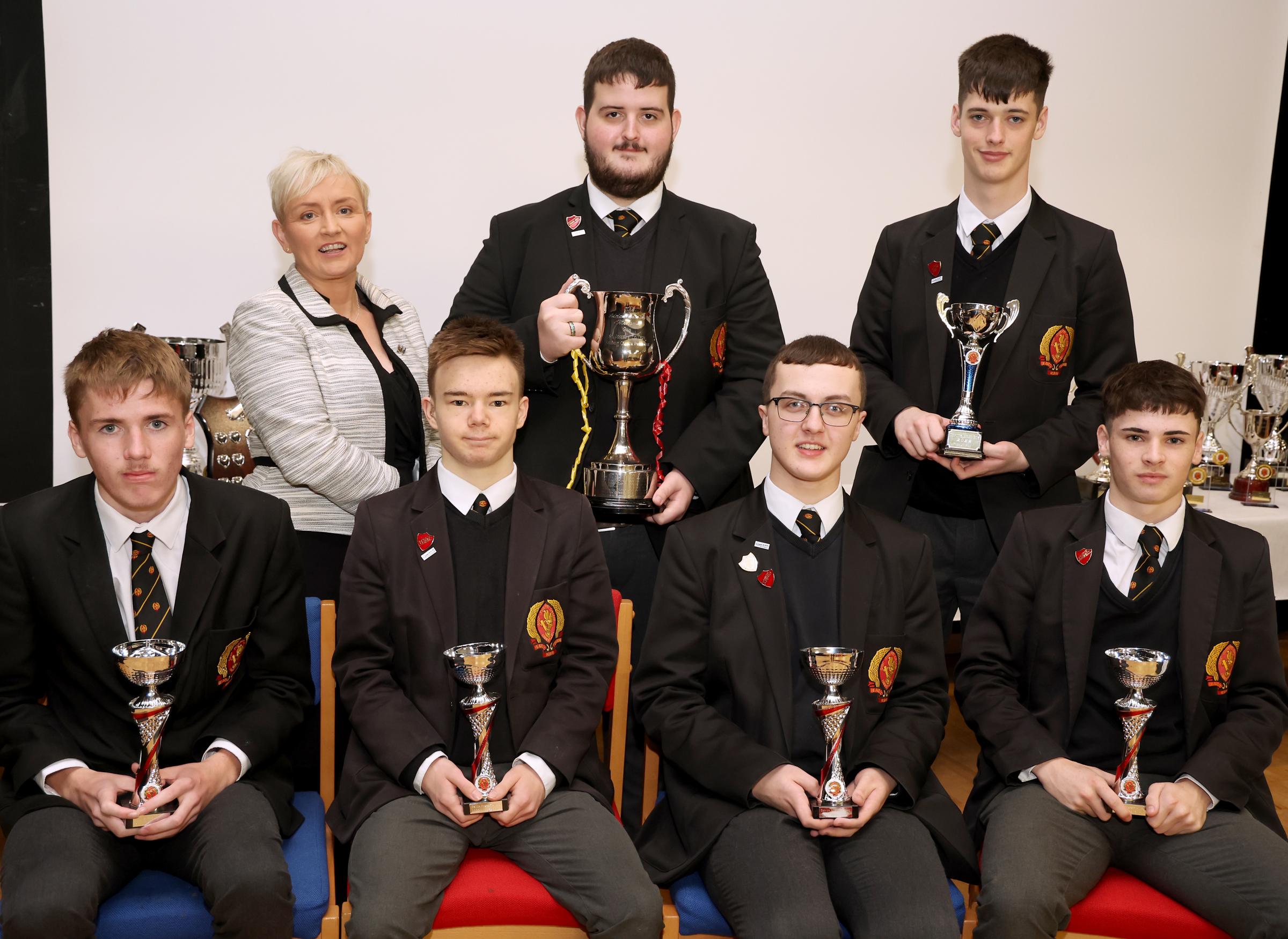 Year 14 Prize Winners are front from left, Joe Doherty, Michael Boyle, Eoin Bullion and Corey Smith. Back from left, Hilina Palmer, Principal, Dennis McGinley, Head Boy and Sean Fee, Deputy Head Boy.