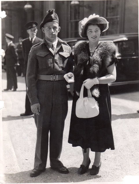  Robert Robinson at Buckingham Palace after receiving his Distinguished Combat Medal (DCM) from King George. He was accompanied by his youngest sister Millie.