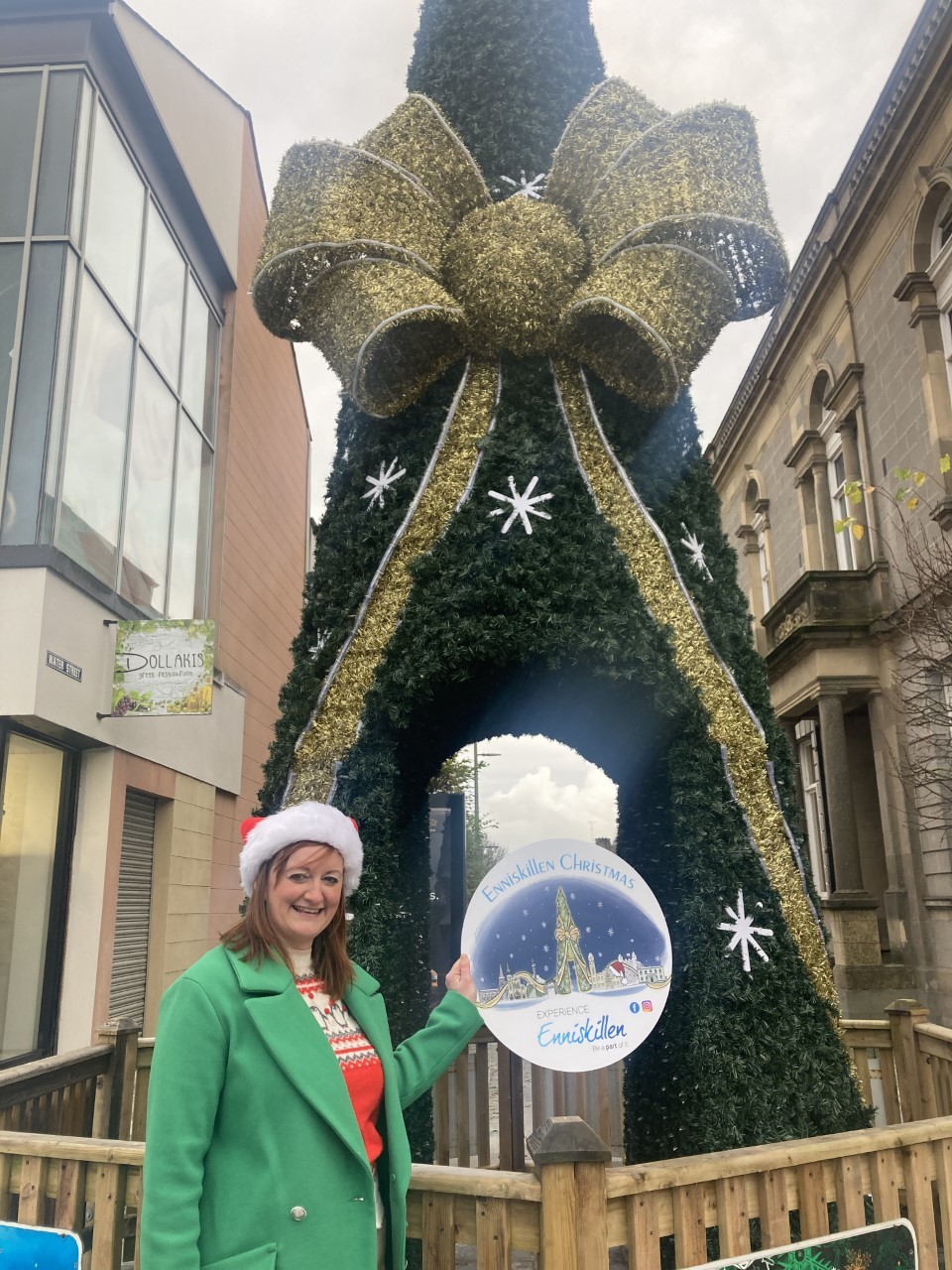 Noelle McAloon, Enniskillen BID manager pictured with the new walk-through Christmas tree in Enniskillen.