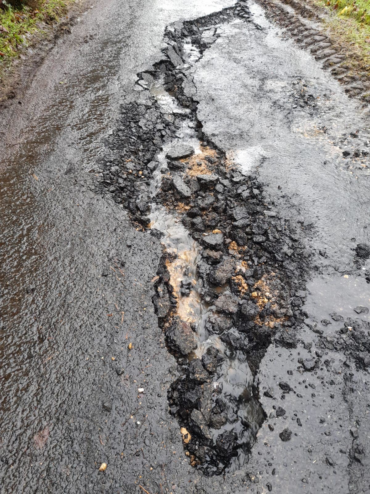 Damage to road surface on Toneyvarnog Road in Co. Fermanagh.