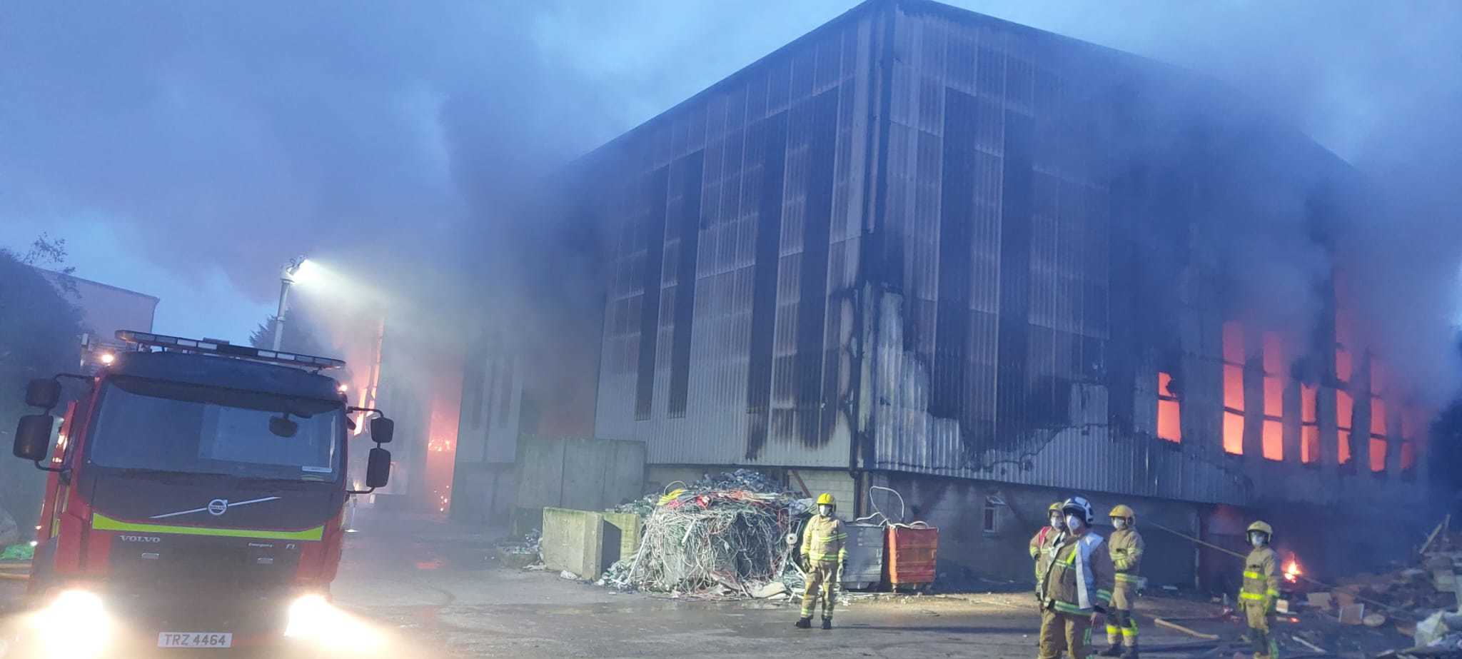 Firefighters tackle a blaze at Skip Services Enniskillen. Photo: Northern Ireland Fire and Rescue Service.