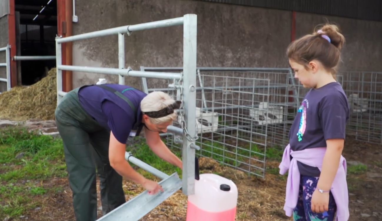 Vicky Byers and daughter Poppy hard at work on the farm.