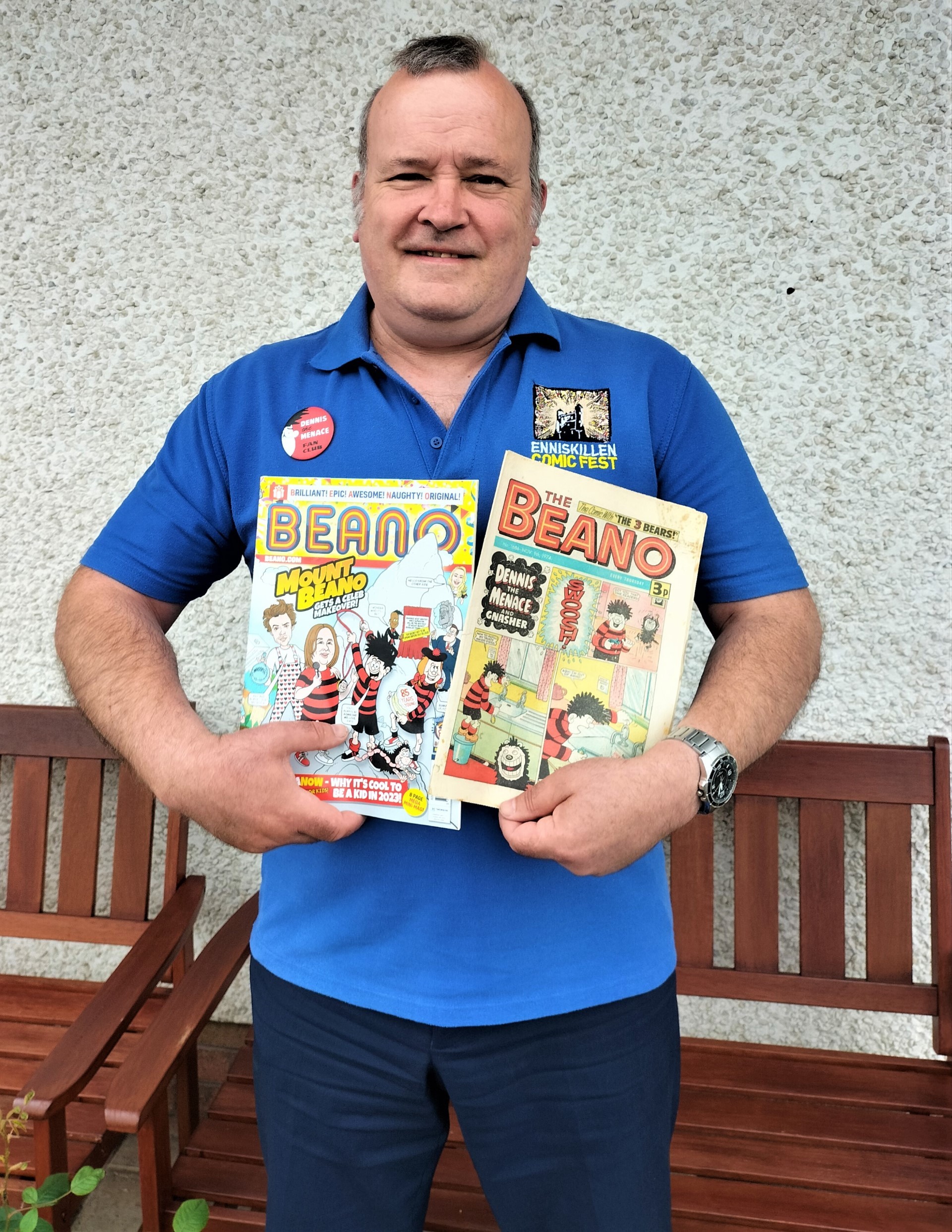 Paul Trimble pictured holding The Beano 85th birthday edition and one of his issues from the early 1970s.