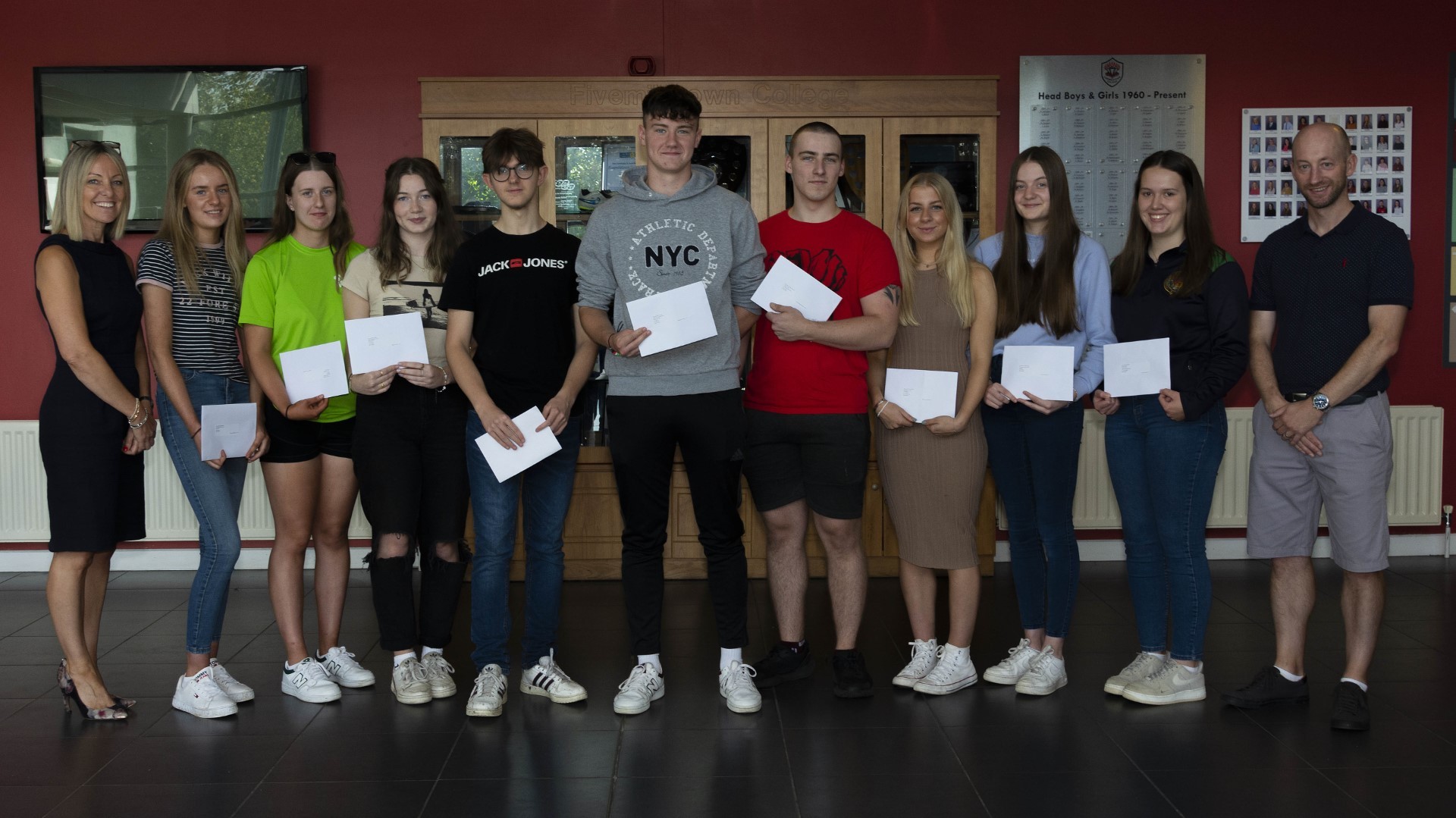 Year 14 students at Fivemiletown College receive their A-Level results. Pictured from left: Principal Janice Allen, Jessica McKeown, Sophie Moore, Robyn Little, Ryan Burgess, Matthew Clarke, Alexis Baranovskis, Rebecca Copeland, Amy McClung, Kaitlin