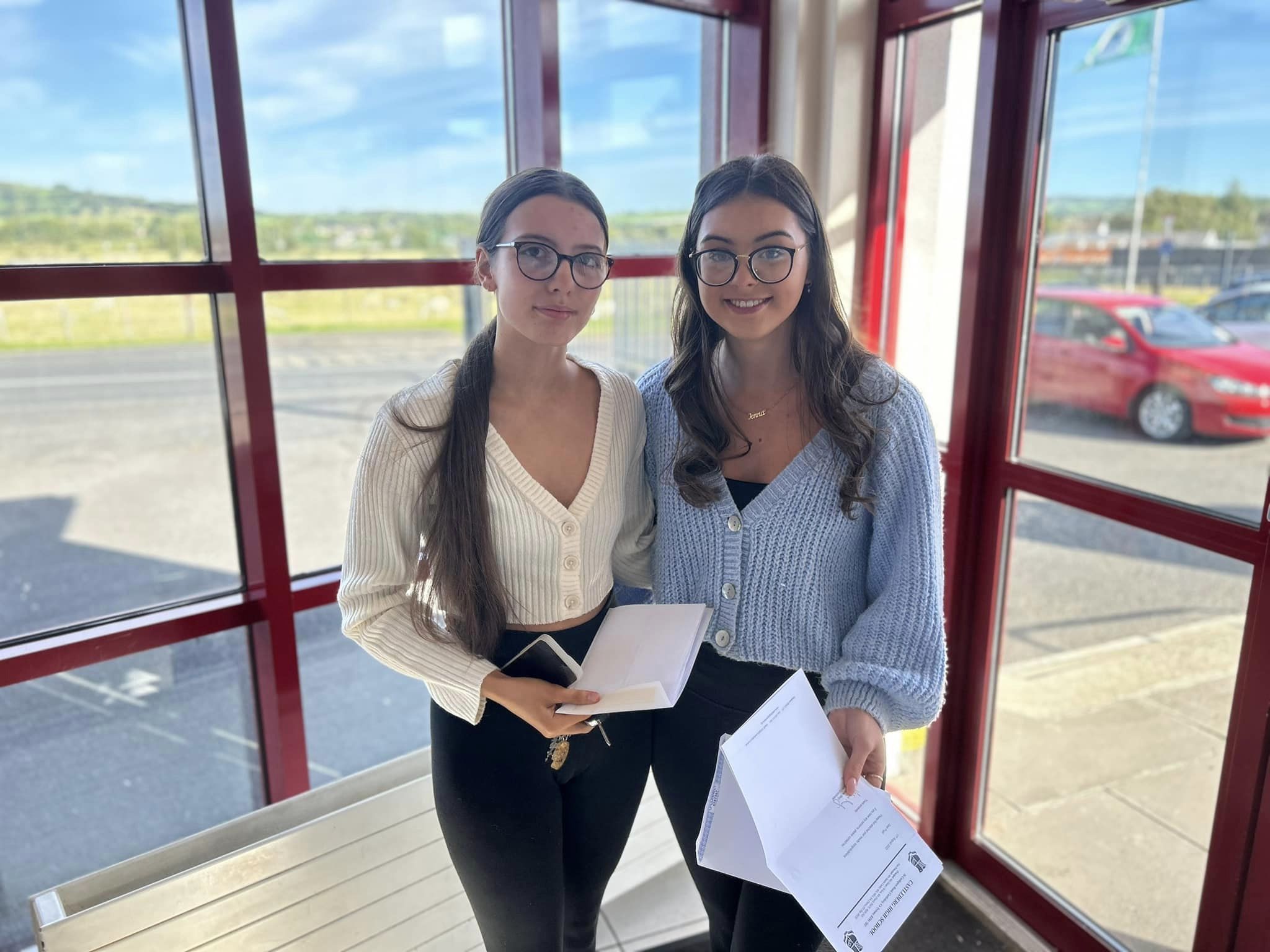 Delighted Castlederg High School Students sharing their results: Chloe Stevenson ABC and Jenna Forsythe A*AA.