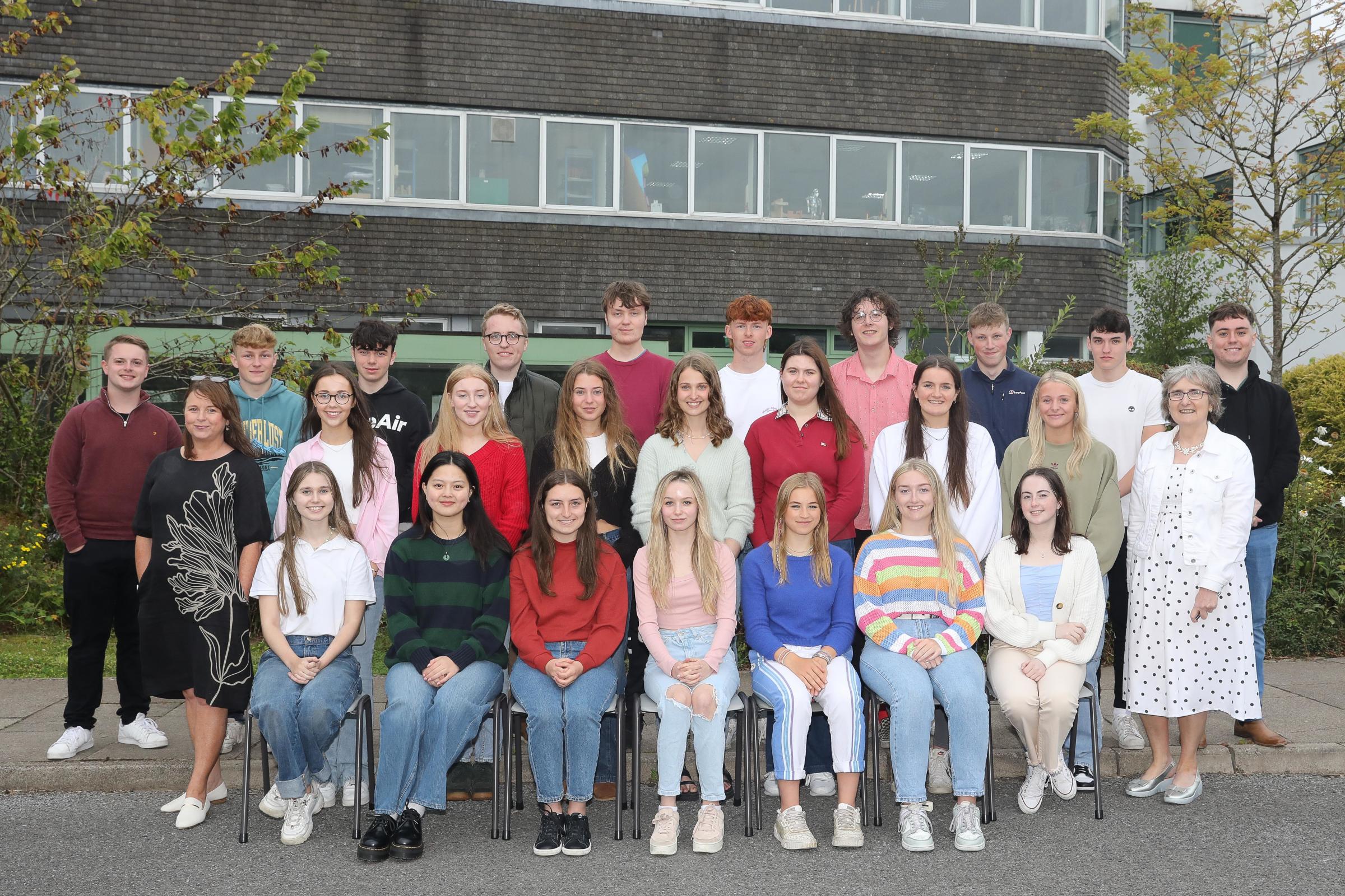 Enniskillen Royal Grammar School students receiving their A-Level results. Pictured front row, from left: Catherine Fleming, Angel Huang, Kayla Noble, Rachel Stewart, Olivia Williams, Emily Morton and Grace Farrell. Middle row, from left: Head of Careers