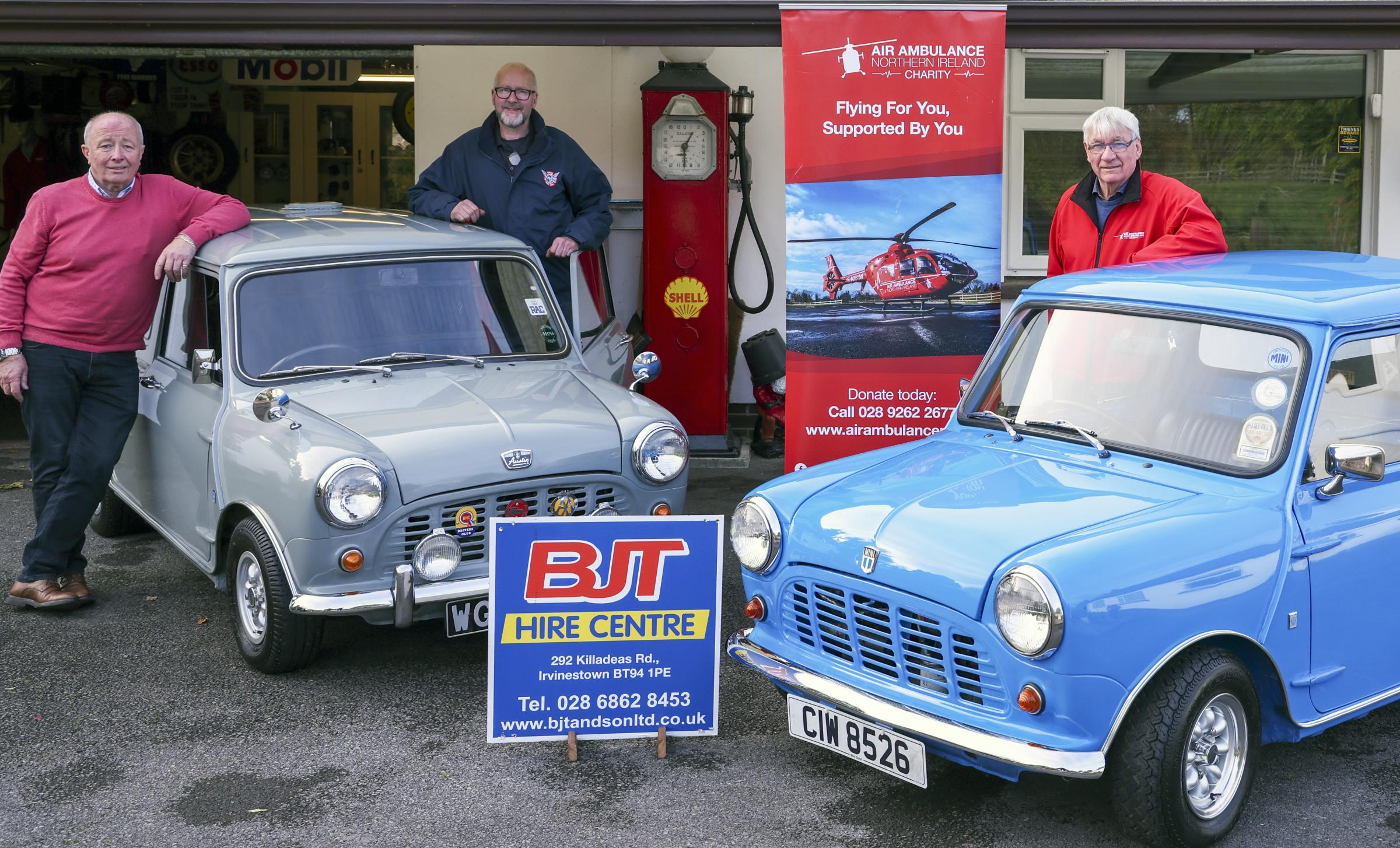 George Ogle and Ian Henderson, Erne Vintage Car Club and George Irvine, Air Ambulance marking £14,000 raised for Air Ambulance as a result of the recent vintage car show held at Castle Irvine. Missing from the photo is a represntative of BJT& Son