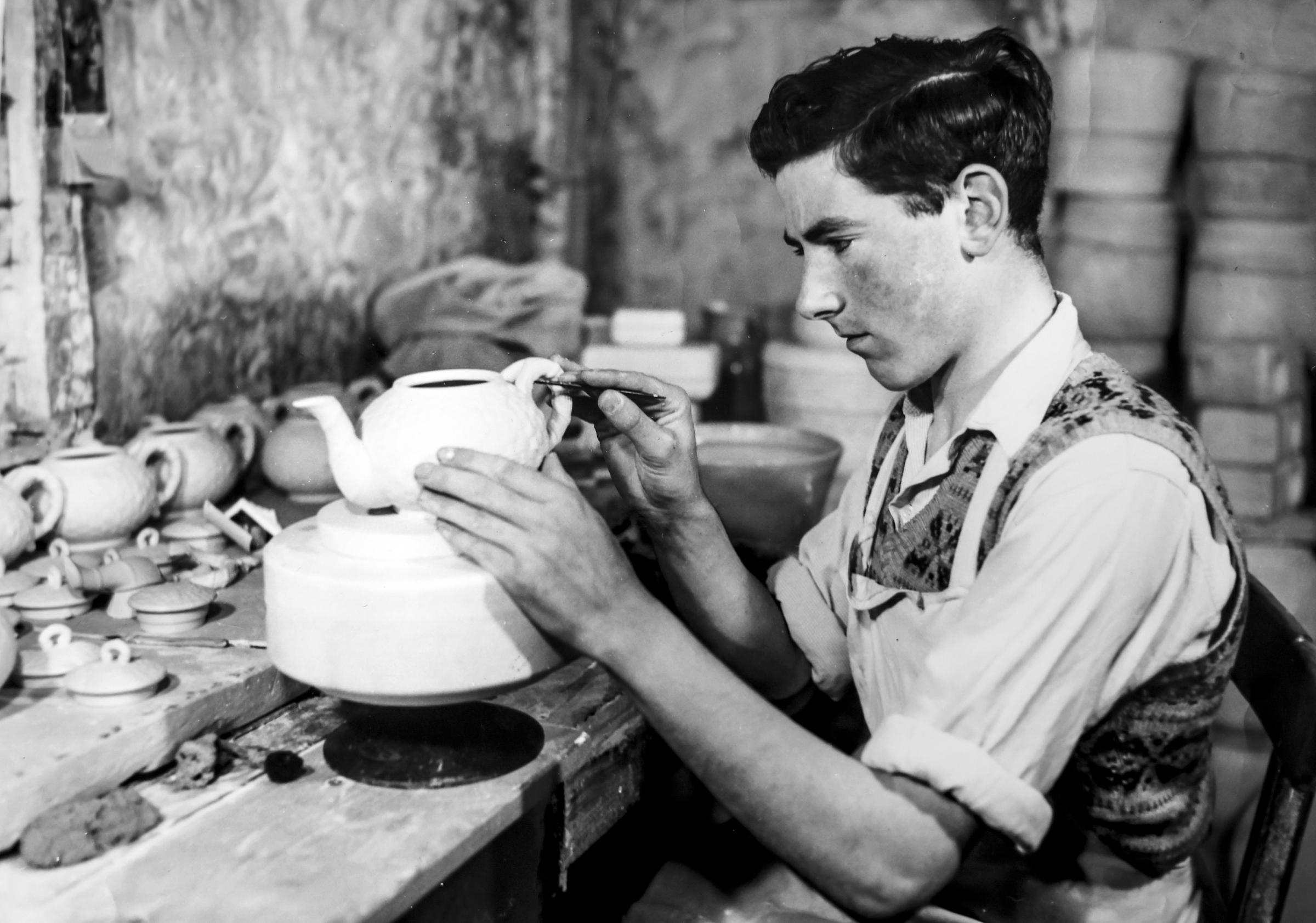 Sean OLoughlin working on a piece of Belleek Pottery in 1958.