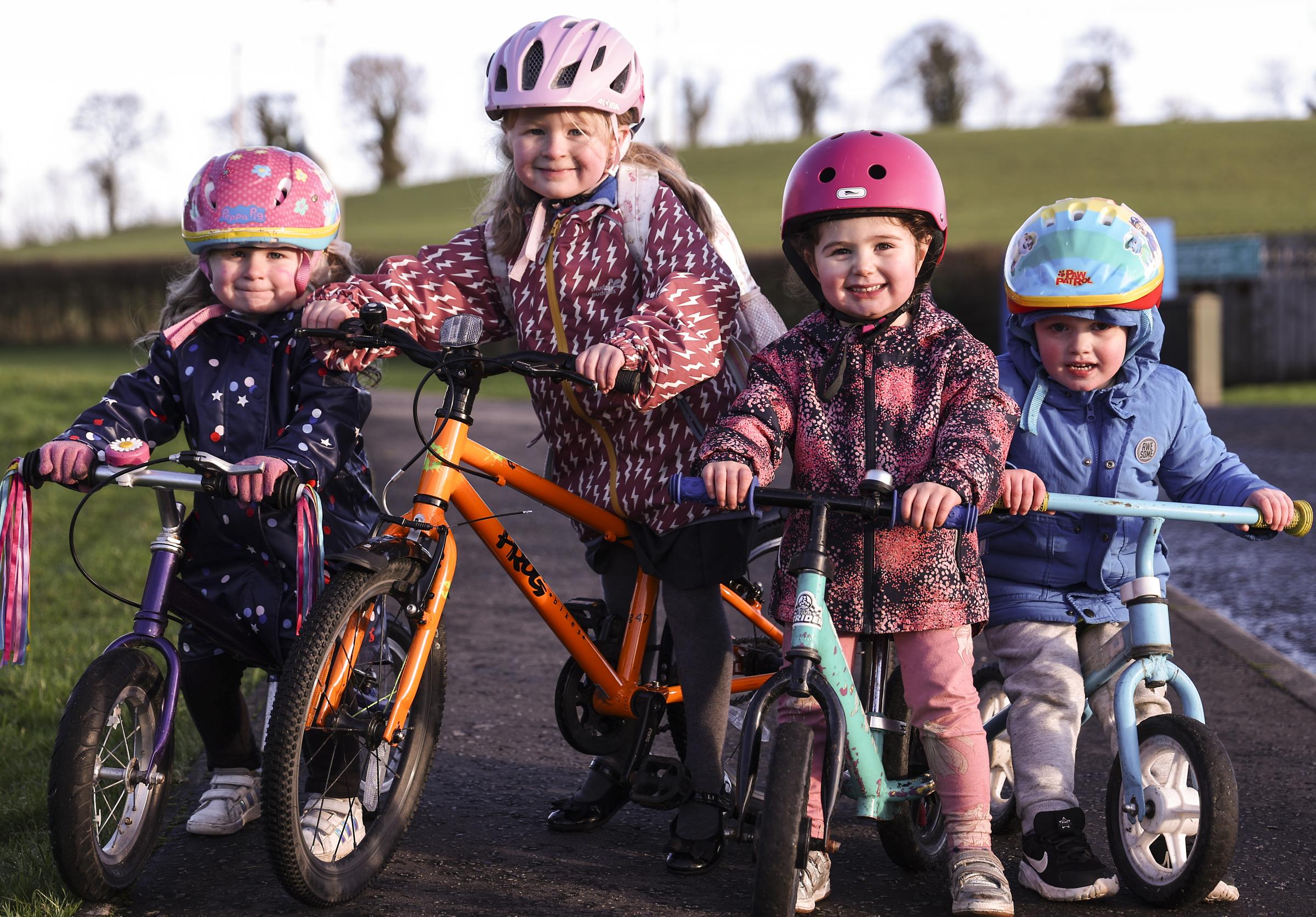 Heidi Wilson, Hettie Wilson, Ciara Reihill and Freddie Cochrane, on their bicycles in Maguiresbridge.