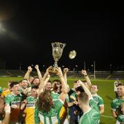 The Derrylin players celebrate their Junior Championship win tonight at Brewster Park.