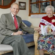 Lord Brookeborough presenting Kathleen Harvey with her birthday card from Queen Elizabeth II in 2021, upon turning 100 years old.