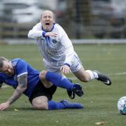 Craig McWilliams with a flying tackle against Lee Glass.