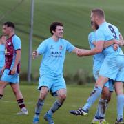 Cathal Beacom is congratulated after equalising for Town against Tummery.