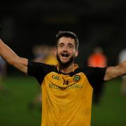 Match winner Ryan Lyons celebrates at the final whistle. Photo: Donnie Phair